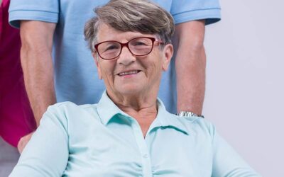 NIBA Medicare Products. Smiling elder woman wearing glasses.